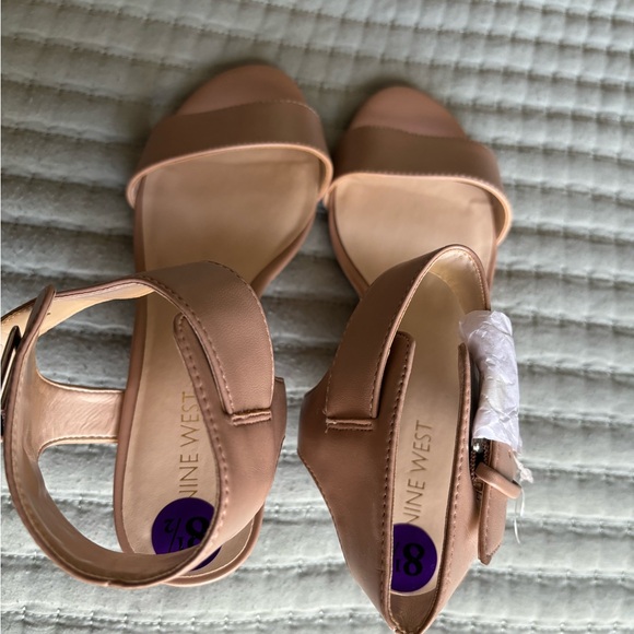 New, Nine West cream color wedges. There is 1 small indent on right shoe. - Picture 5 of 5